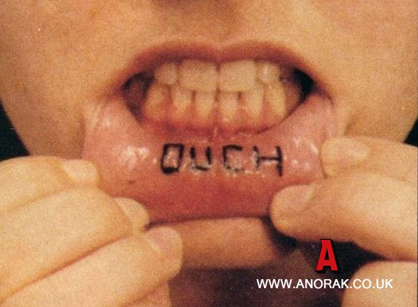  your lips droops and expose the words “POOP SEX”. The Greatest Tattooed 
