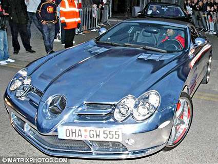  just bought a shiny chrome Mercedes sports car worth around 350000