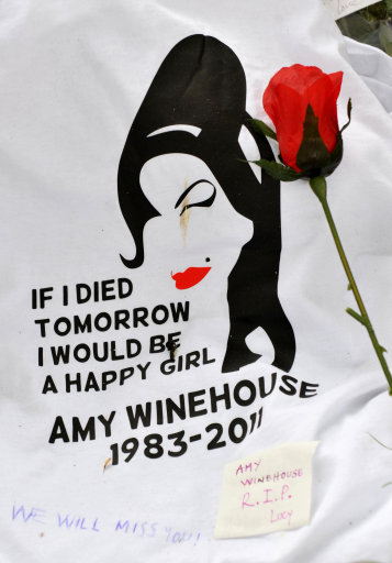  Handed Out To Grievers AMY WINEHOUSE'S death wasn't pleasant at all