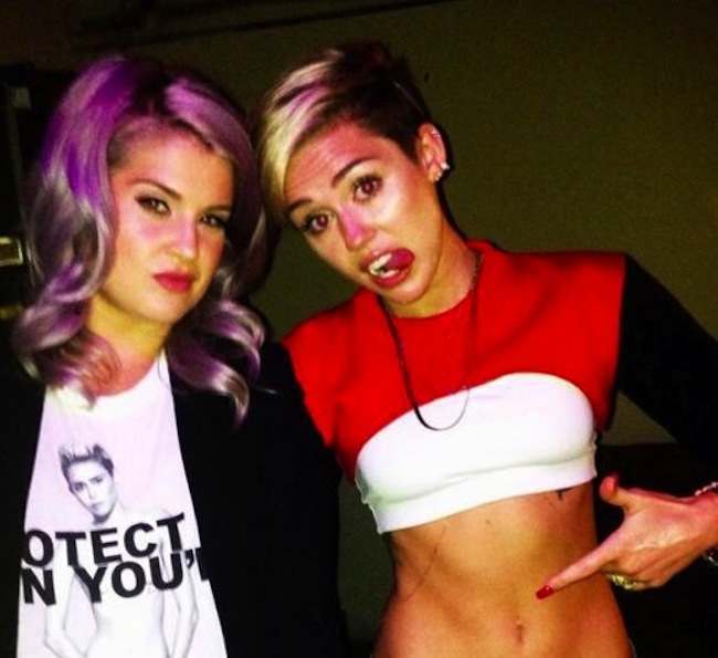 miley tongue 6 Kerry Katona taught Miley Cyrus tongue everything it knows about rimming the media (photos)