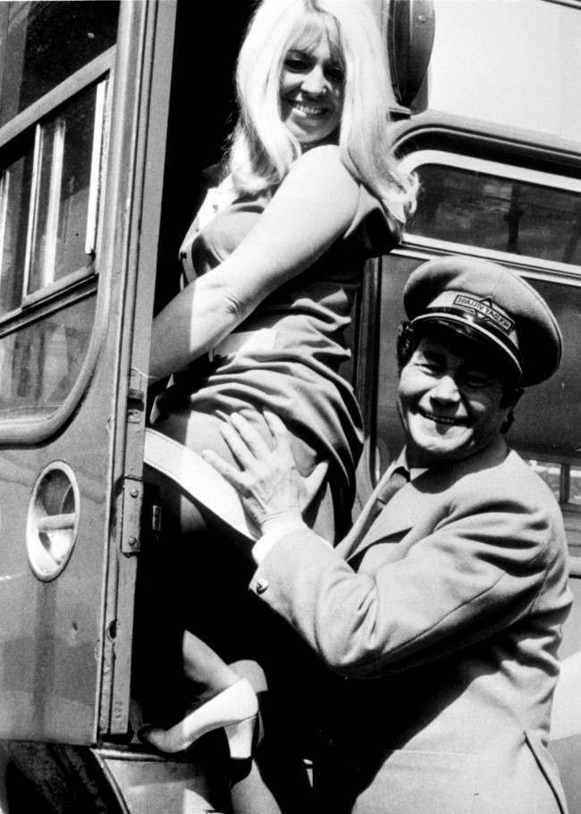Nat Cohen's legacy: Reg Varney and Carole Donoghue filming On The Buses. 1973