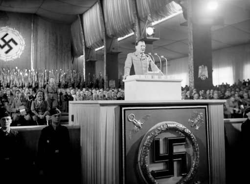 Field Marshal Hermann Goering makes his dramatic speech at Nuremberg, Germany on Sept. 10, 1938. In a violent two-hour polemic at Nuremberg, Field Marshal Goering attacked the Czech government, boasted Germany’s vast food stores were sufficient to defy any blockade, that her western fortifications were impregnable and that her air force was the strongest in the world. He also criticized England, pointed to the unrest in Palestine. 