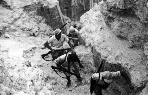 The authorities are still making a determined bid to wipe out bands of rebels who are terrorizing Palestine. Volunteer “terror squad” of police-helpers, armed with rifles, scouring the mountains of Samaria, central Palestine, in pursuit of rebels on Oct. 24, 1938. 