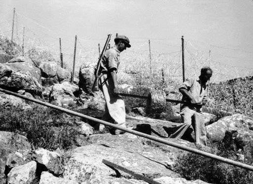 American Jewish colonists in Palestine completing the so called Tegart fence on August 23, 1938, which cost 500,000 dollars to build. It is 75 kilometres long, on the Palestine-Syria border, was suggested by Sir Charles Tegart, part of the British scheme to stamp out the Palestine disorders. 