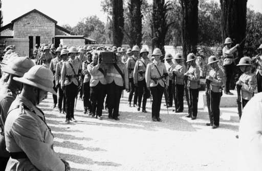 Funeral for British army victim of the Arab revolt in Palestine, who was buried with full military honors by his comrades, at Ramla, near Jerusalem, Sept. 9, 1938.