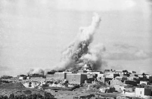 The British army dynamites Arab stone houses in northern Palestine in reprisal for rebel activities, Jan. 9, 1939. 