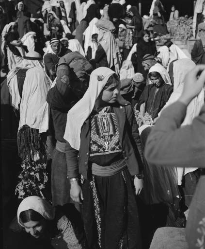 Arab girls shop in the market place near Manger Square in Bethlehem, Nov. 28, 1947. 