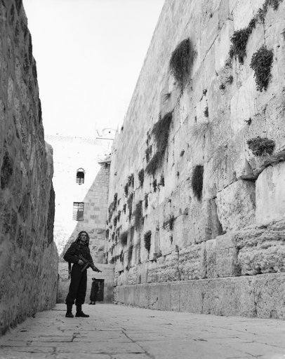 An Arab, armed with a sub-machine gun, stands guard at Jerusalem’s Wailing Wall on Feb. 23, 1948. Jews are being kept from this centuries-old holy place by Arabs for the first time since the Arab-Jewish disorders in 1939. 