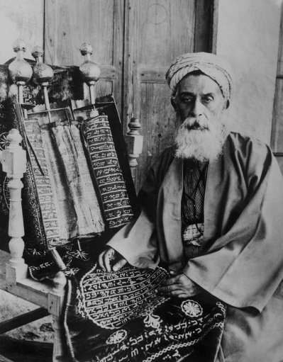 On Mount Gerizim, outside Nablus, in central Palestine, there is an ancient Jewish sect known as the Samaritans, which claim to have lived in the Holy Land continuously since the time of Moses. At Passover they conduct the ancient sacrifice of a lamb upon an altar. Aaron, the high priest of the Samaritans with some of their laws, inscribed on ancient scrolls in the Aramaic text shown May 16, 1930.