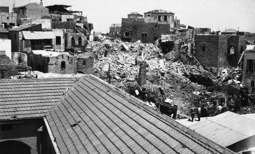 In order to destroy the strongholds and hiding places of anti-Jewish Arab rioters in this city British troops were detailed off to blow up the older portions of the city with dynamite. Other troops were posted throughout the town to deal with hostile Arab demonstrations from those who had been evicted. The demolition also cleared the way for the building of new roads. A general view of the older part of Jaffa, Israel on July 3, 1936 after buildings had been blown up with dynamite. (AP Photo)