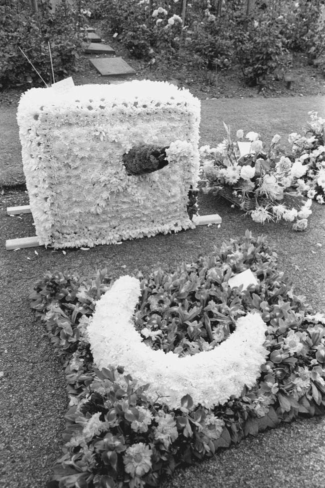 Floral tributes at Golders Green Crematorium in North London for the funeral of Keith Moon, the drummer of English rock group The Who, who died from a drug overdose. Picture by: PA/PA Archive/Press Association Images