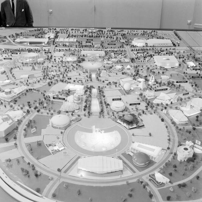 Mushrooms and angular shapes of all sorts rise like geometric forms in this view of part of the model of the New York WorldÂs Fair which will open on April 22, 1964. In the center is the Promenade of Industry, from the Pool of Industry Dancing Waters fountains (lower center) to the stainless steel Unisphere. This representation of the globe will set the fairÂs theme shown May 1, 1963, ÂPeace Through Understanding.Â The buildings are those of U.S. industry and various states. (AP Photo/RG)