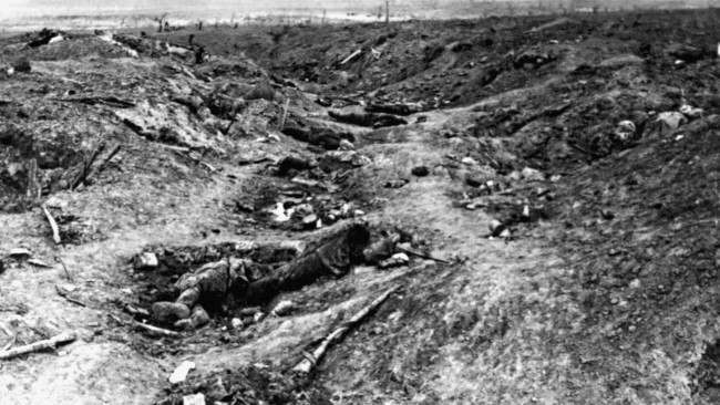 A scene in one of the German trenches in front of Guillemont, near Albert, during the Battle of the Somme. It shows the havoc wrought by the British bombardment, with German dead visible in the photograph. Guillemont was captured by the British in late September, 1916. 
