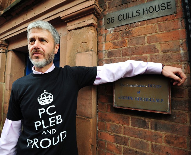 Chairman of Warwickshire Police Federation Simon Payne outside the constituency offices of MP Andrew Mitchell, for the launch of a poster campaign against police cuts, in Sutton Coldfield, West Midlands. Picture date: Wednesday September 26, 2012. 