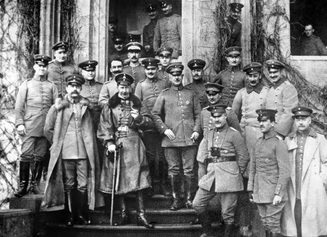 The Crown Prince Wilhelm at his temporary residence, surrounded by his staff officers. 1914