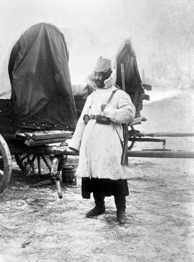 A German soldier of the Landstrum, wearing a fur coat with a Medici collar.