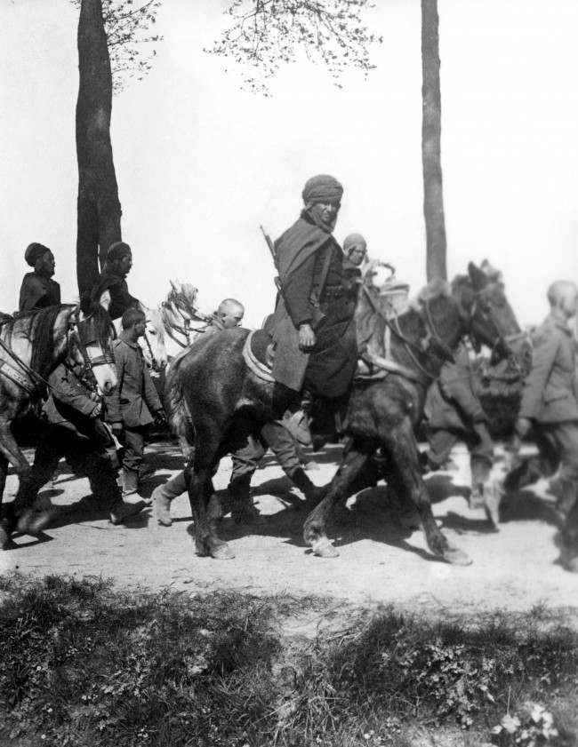 A convoy of German prisoners escorted by French Algerian Sphais, of which there were 14 regiments in the French Army.