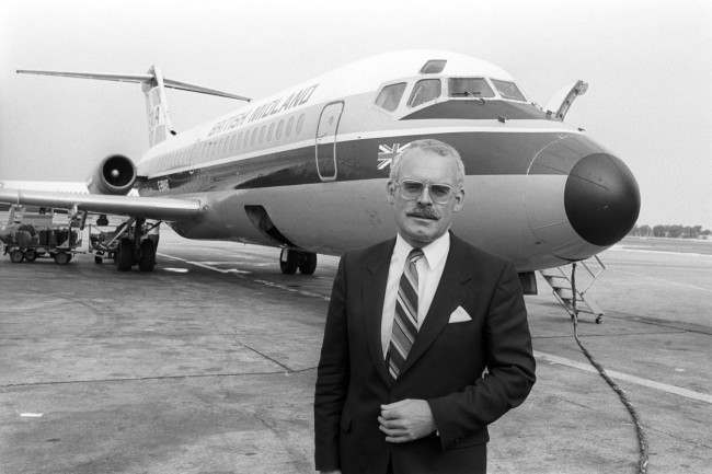 British Midland airline's chairman Mr Michael Bishop in front of a DC9 aircraft. 