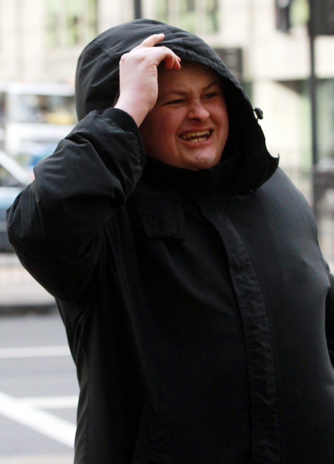 John Nimmo, 25, from South Shields, arriving at Westminster Magistrates Court, London, where he and Isabella Sorley, are to appear in court charged with improper use of a communications network in relation to tweets to campaigner Caroline Criado-Perez. Picture date: Tuesday January 7, 2014. The Crown Prosecution Service (CPS) announced last month that both had been charged under Section 127 of the Communications Act. However it would not be in the public interest to prosecute over messages allegedly sent to MP Stella Creasy. See PA story COURTS Twitter. Photo credit should read: Sean Dempsey/PA Wire