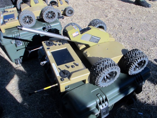A wireless, camera-equipped robot is displayed by the U.S. Border Patrol during a briefing in Nogales, Ariz., Tuesday, Jan. 14, 2014. With more than 75 underground drug smuggling tunnels found along the border since 2008, mostly in California and Arizona, the U.S. Border Patrol is utilizing the robots to assist in their search. (AP Photo/Brian Skoloff)