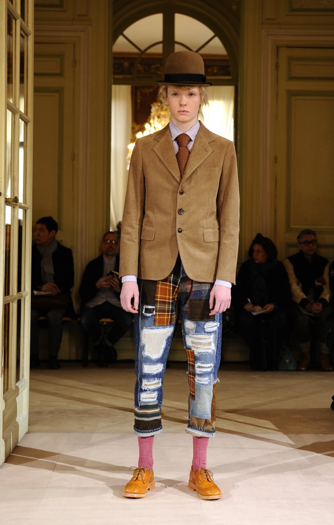 A model wears a creation during Watanabe men's fall-winter 2014-2015 fashion collection presented in Paris, Friday, Jan.17, 2014. (AP Photo/Zacharie Scheurer)