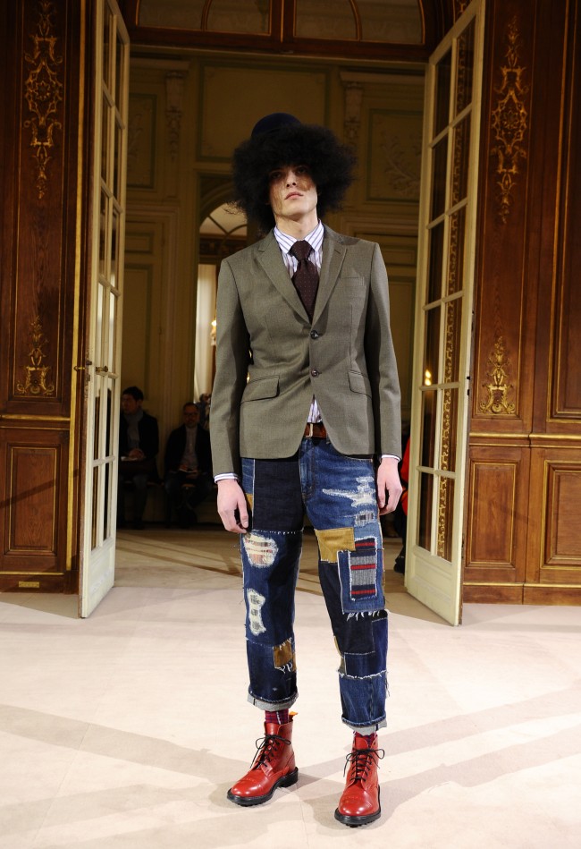 A model wears a creation during Watanabe men's fall-winter 2014-2015 fashion collection presented in Paris, Friday, Jan.17, 2014. (AP Photo/Zacharie Scheurer)