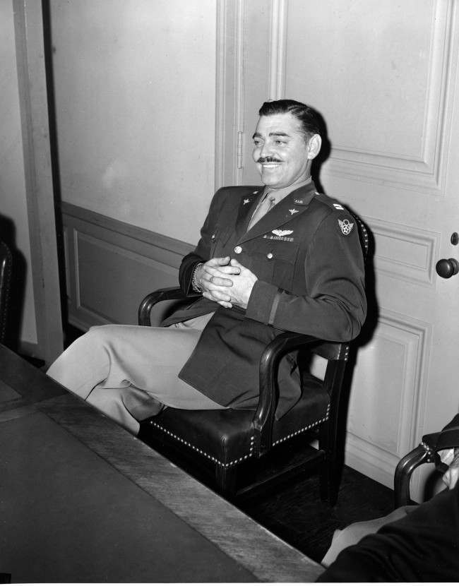 Capt. Clark Gable, erstwhile film actor, faced the press in the Pentagon in Washington, Oct. 27, 1943. Gable flew operational missions over Europe in B-17s to obtain combat film footage to be used for training purposes, and has just returned to the U.S. (AP Photo/Gene Abbott)
