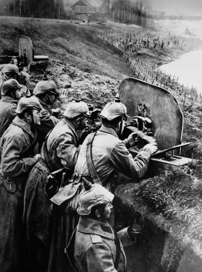 Ready for Russian rush - The Germans had better arms and better transportation than the Russians in World War I. Their machine guns devastated the masses of Russians rushing at them in attack. By the end of the first winter one Russian in four went into the field without a gun. Here German infantrymen aim their machine guns at the Russians from a trench at the Vistula River in Russia, in 1916.