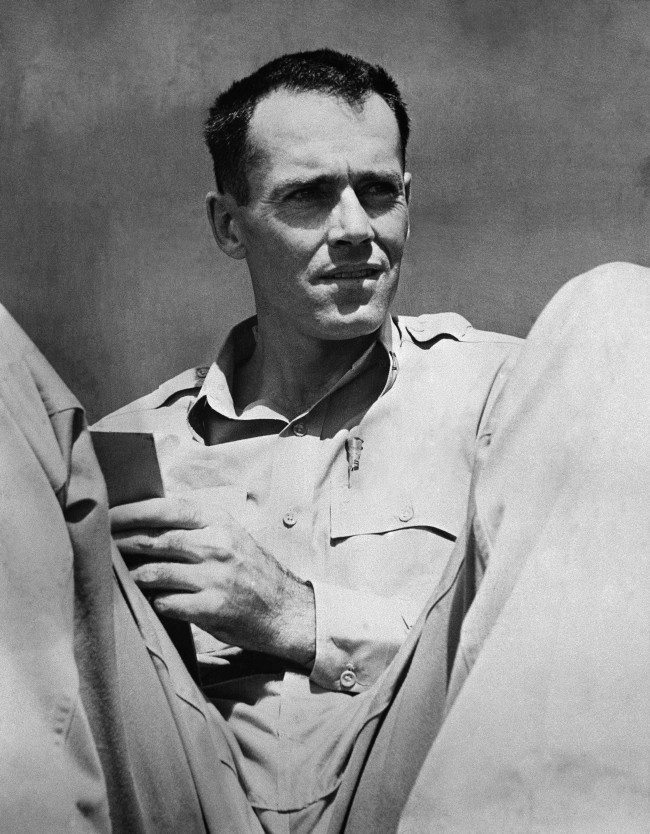 Lieutenant Henry Fonda, former Hollywood movie star, relaxes in a South Pacific area, July 10, 1944 where he is now on active duty on the staff of Vice Adm. J.H. Hoover, U.S. Navy commander of the forward area, Central Pacific. Fonda joined the navy as an ordinary seaman. (AP Photo)