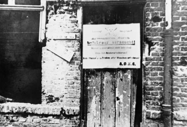 The gas war starts: German notices are posted up by German troops who fought at Armentiere, France in an undated photo, warning their comrades not to enter any houses or dug outs nor to drink the water. (AP Photo)