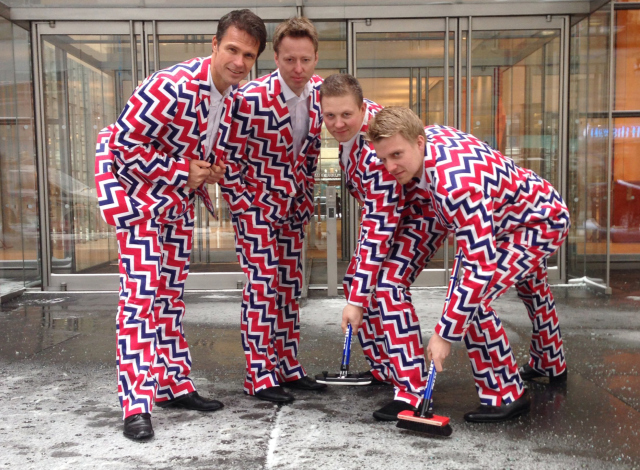 Member of Norway's Men's Olympic Curling Team from left Thomas Ulsrud, Torgor Nergard, Christoffer Svae, and Havard Vad Petersson wear their new Sochi 2014 suits as they pose for a photographer in New York Tuesday Jan. 21, 2014. (AP Photo)