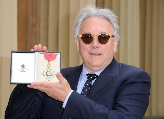 Record producer Trevor Horn poses in the Quadrangle of Buckingham Palace, London after being presented with a Commander of the British Empire (CBE) by the Prince of Wales. Picture date: Wednesday May 11 2011.