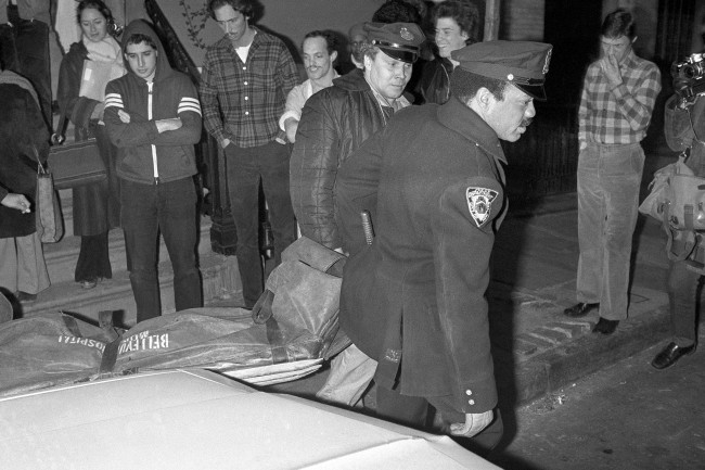 New York City police carry the body of punk rock star Sid Vicious from apartment in the Greenwich Village section of New York, Feb. 2, 1979. Authorities said that Vicious whose real name was John Simon Ritchie apparently died of an overdose of heroin he took at a party celebrating his release from prison the day before. He had been released on $50,000 bail pending trial in the fatal stabbing of his girlfriend Nancy Spungen. (AP Photo/G. Paul Burnett) 