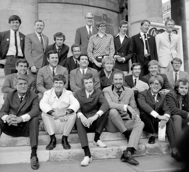 r Robin Scott, Controller, Light Programme, who heads the BBC's new Radio 1 (Pop) and Radio 2 (Light) radio network, pictured (centre, background) at Broadcasting House, Portland Place with disc jockeys who will be in the spin of things on Radio 1, many of them were formerly with "pirate" radio stations. Left to right: Back row - Tony Blackburn, Jimmy Young, Kenny Everett, Duncan Johnson, David Rider, Dave Cash, Pete Brady and David Symonds. Middle row - Bob Holness, Terry Wogan, Barry Alldis, Mike Lennox, Keith Skues, Chris Denning and Johnny Moran. Front row - Pete Murray, Ed Stewart, Pete Drummond, Mike Raven, Mike A'Hern and John Peel.