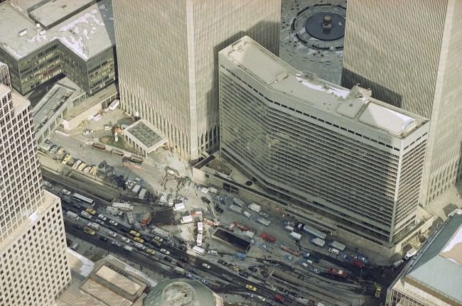 Manhattan's West Street is jammed with police and emergency service vehicles in the aftermath of yesterday's explosion that rocked New York's World Trade Center's twin towers and the Vista Hotel, foreground right, Feb. 27, 1993, causing evacuation of the financial center. Officials all but confirmed that a bomb caused the huge blast that left at least five people dead and injured hundreds. 