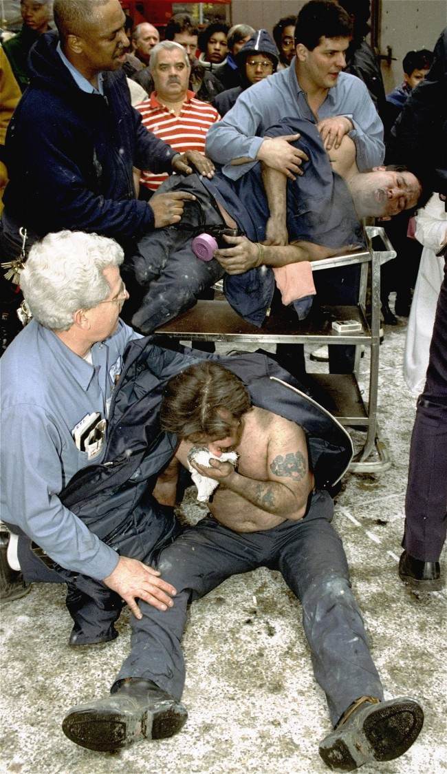  In this file photo of Feb. 26, 1993, Victims of a fire at the World Trade Center in New York are treated at the scene after an explosion rocked the complex. Twenty years ago a group of terrorists blew up explosives in an underground parking garage under one of the towers, killing six people and ushering in an era of terrorism on American soil. 