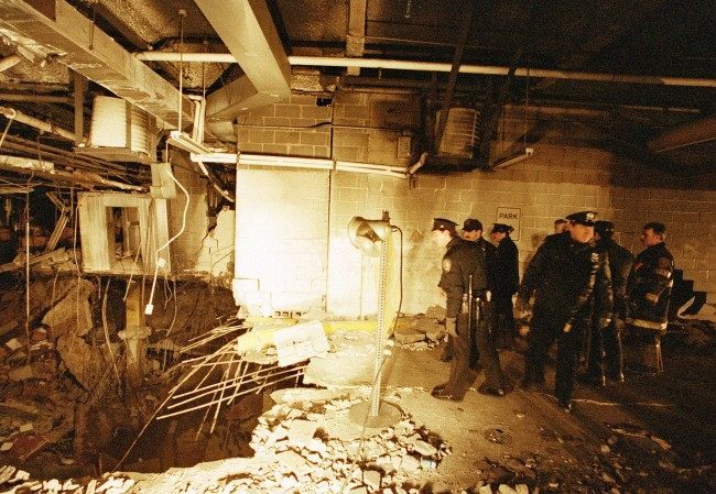  In this file photo of Feb. 27, 1993, police and firefighters inspect the bomb creater inside an underground parking garage of New York's World Trade Center the day after an explosion tore through it. Twenty years ago a group of terrorists blew up explosives under one of the towers, killing six people and ushering in an era of terrorism on American soil.