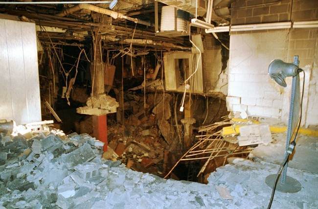 n this file photo of Feb. 27, 1993, a crater is exposed in an underground parking garage of New York's World Trade Center the day after an explosion tore through it. Twenty years ago a group of terrorists blew up explosives under one of the towers, killing six people and ushering in an era of terrorism on American soil.