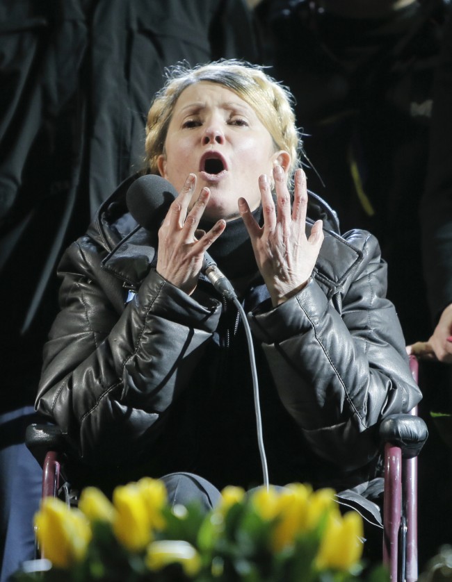 Former Ukrainian prime minister Yulia Tymoshenko addresses the crowd in central Kiev, Ukraine, Saturday, Feb. 22, 2014. Hours after being released from prison, former Ukrainian prime minister and opposition icon Yulia Tymoshenko praised the demonstrators killed in violence this week as heroes.