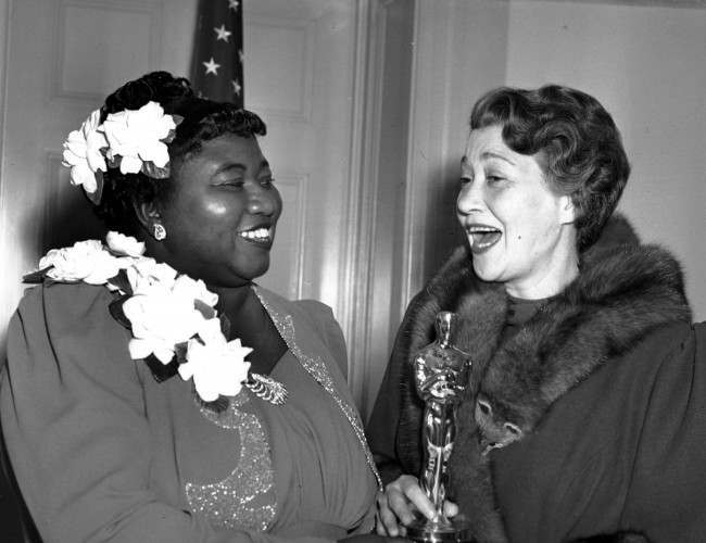 Hattie McDaniel, left, was given the Motion Picture Academy award for the best performance of an actress in a supporting role in 1939 for her work as "Mammy" in the film version of "Gone With the Wind" on Feb. 29, 1940 in Los Angeles, Calif. The presentation of the award was given by actress Fay Bainter, right.