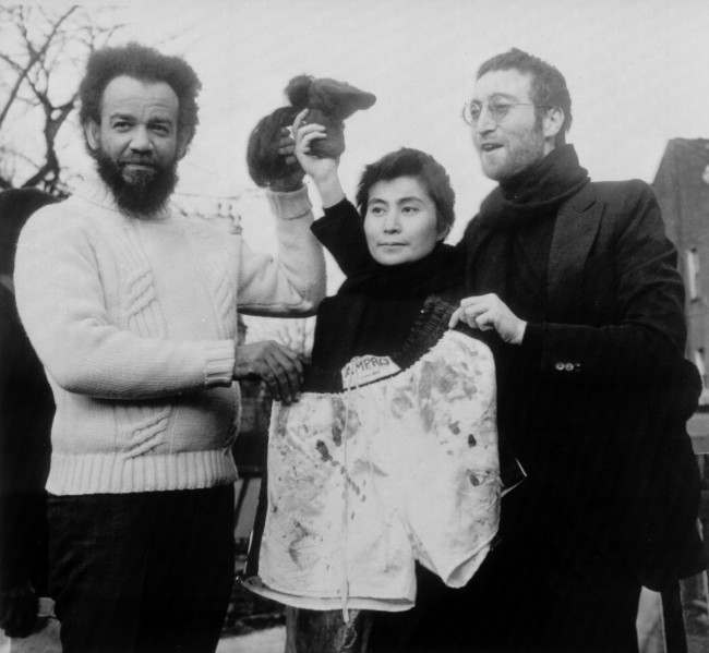 John Lennon and his wife Yoko Ono give some of their shorn hair to Abdul Malik, British Black Muslim leader, in London, Feb. 4, 1970. In exchange, Malik presents the Lennons with a pair of boxer's shorts he said were given to him by fomer world heavyweight boxing champion Muhammad Ali. Malik said the hair would be auctioned to the highest bidder. 
