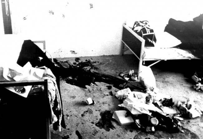 Blood stains and bullet holes mark the place where the Israeli weightlifter Moshe Romano was killed Sept.7, 1972 by Arab commandos inside the Israeli Olympic team's quarters at the Olympic Vilalge in Munich,West Germany. Photo shows the room where eight Israeli athletes were kept hostage for 18 hours. (AP Photo/str)