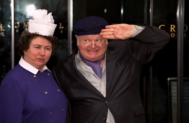 Benny Hill plays his Fred Scuttle character on leaving the Cromwell Hospital in London, 1992. Just 3 months before he died. JOHN STILLWELL/PA Archive/Press Association Images