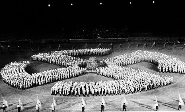 This Associated Press photo shows the Swastika, during rehearsals at Berlins stadium, June 20, 1938, Berlin, Germany. The stadium will again will be filled to capacity when the Hitler Youth and the SA are celebrating summer solstice day in the Olympic Stadium, June 21, 1938, Berlin, Germany. Hundreds of SA men will form a torchlight sun wheel in Germany on June 28, 1938. (AP Photo)