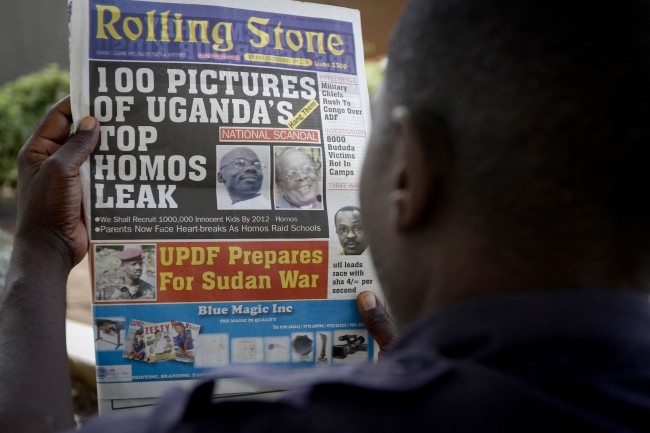 A Ugandan man reads the headline of the Ugandan newspaper "Rolling Stone" in Kampala, Uganda. Tuesday, Oct. 19, 2010, in which the papers reveals the identity of allegedly gay members of Ugandan society and calls for public punishment against those individuals. The "Rolling Stone" is a fairly new publication under the management of Giles Muhame, a Ugandan journalist..rights activitists say that at least four homosexuals have been attacked since a Ugandan newspaper published an article this month called "100 Pictures of Uganda's Top Homos Leak _ Hang Them." A year after a Ugandan legislator tried to introduce a bill that would have called for the death penalty for being gay, rights activists say homosexuals face a host of hostility. (AP Photo)