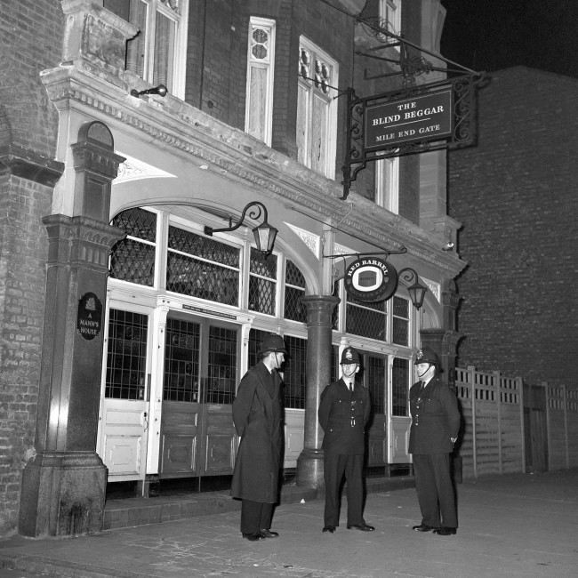 Police are pictured outside the Blind Beggar Public House, Whitechapel Road. PA/PA Archive/Press Association Images