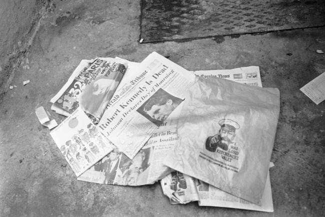 Newspapers, paper bag and an air travel guide which were found in the bed room of the Pax Hotel, where a man identifying himself as Ramon George Sneyd, are lying near a dust bin outside the hotel in Pimlico, London on June 10, 1968. The proprietor of the hotel, Mrs. Anna Thomas said that Ramon George Sneyd lived in her hotel from June 5 to June 8. Ramon George Sneyd was arrested at LondonÂs airport on June 8 for carrying a false passport and a loaded gun. United States Assistant Attorney General is, seeking a speedy extradition for the man believed to be James Earl Ray, the accused assassin of Dr. Martin Luther King. James Earl Ray had a preliminary hearing in court and was remanded in custody without bail until June 18.  