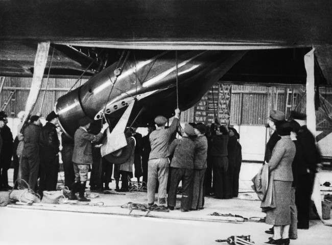 Members of the crew of the Hindenburg are unloading the plane of Jimmy Haizlip in Frankfurt, Germany on June 1, 1936 which was freighted to Germany on the Hindenburg's second flight from the United States.