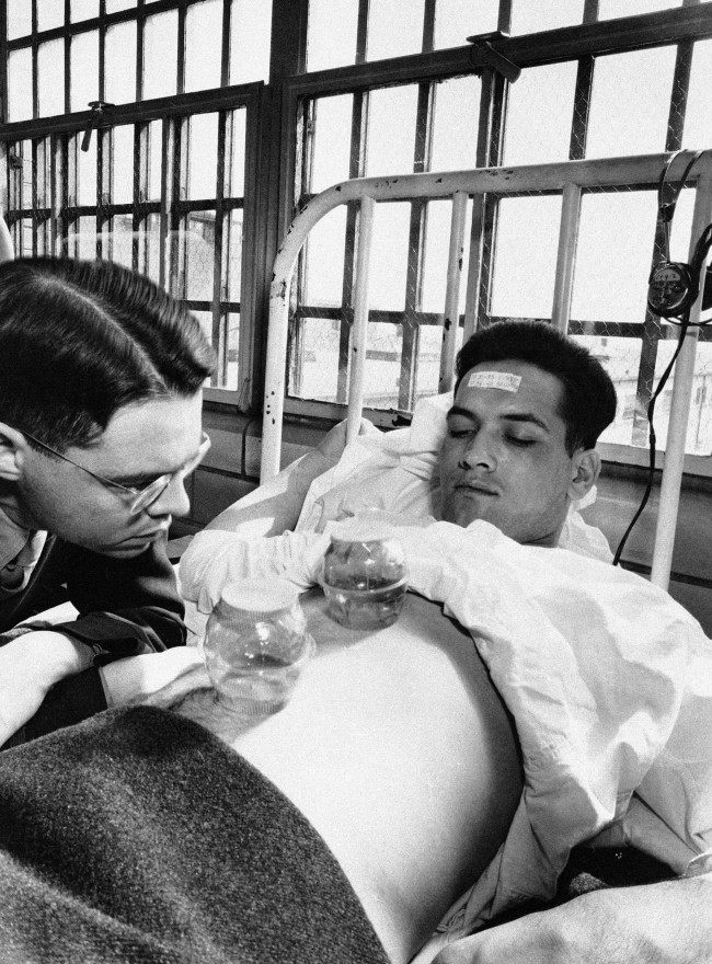 - In this June 25, 1945 picture, an army doctor watches as malaria-carrying mosquitoes bite the stomach of inmate Richard Knickerbockers, serving 10 to 14 years, in the malaria ward at Stateville Penitentiary in Crest Hill, Ill. Around the time of World War II, prisoners were enlisted to help the war effort by participating in studies that could help the troops. A series of malaria studies at Stateville Penitentiary in Illinois and two other penitentiaries were designed to test antimalarial drugs that could help soldiers fighting in the Pacific. Shocking as it may seem, government doctors once thought it was fine to experiment on disabled people and prison inmates. 
