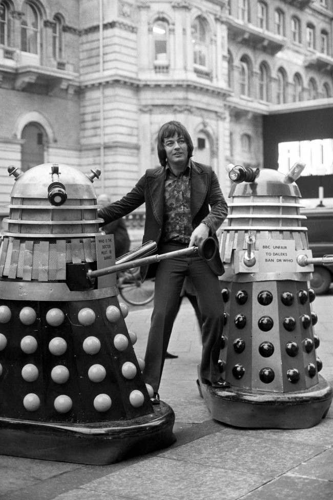 Radio 1 disc jockey Tony Blackburn, finds himself picketed by Daleks outside Broadcasting House, London. The Daleks, arch enemies of Dr Who, were calling for a "ban" on the record "Who is The Doctor", made by the Dr Who himself, Jon Pertwee. Date: 04/12/1972 